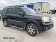 2009 Honda Pilot Touring with VIN 5FNYF48809B035719, listed as a Copart auction lot 63201775 with 202,385 mi miles and Salvage title. Bid and sale history available at DreamBid. Image 4.