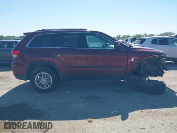 2019 Jeep Grand Cherokee Altitude with VIN 1C4RJEAG3KC851756, listed as a IAAI auction lot 42299986 with 119,115 mi miles and . Bid and sale history available at DreamBid. Image 14.