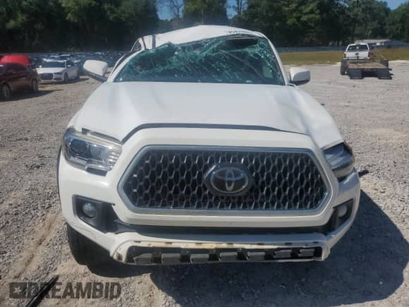 2019 Toyota Tacoma TRD Off Road z VIN 3TMCZ5AN9KM282522, wystawiony jako Copart lot #85939905 z przebiegiem 89 447 mil mil oraz Nie do naprawy • Non repairable. Historia ofert i sprzedaży dostępna na DreamBid. Obrazek 5.