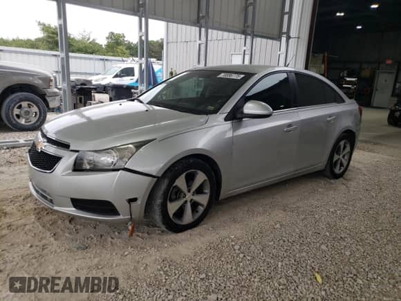 2014 Chevrolet Cruze 1LT with VIN 1G1PC5SB6E7301168, listed as a Copart auction lot 70856775 with 117,491 mi miles and Salvage title. Bid and sale history available at DreamBid. Image 1.