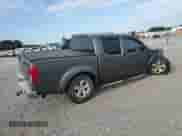 2009 Nissan Frontier SE with VIN 1N6AD07UX9C421105, listed as a Copart auction lot 71951375 with 110,450 mi miles and Salvage title. Bid and sale history available at DreamBid. Image 3.