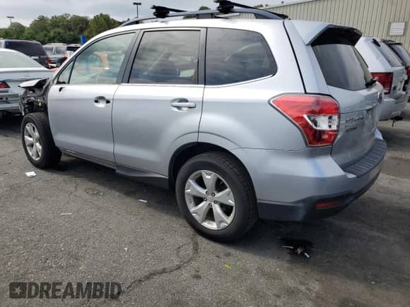 2014 Subaru Forester Limited z VIN JF2SJAHC2EH523881, wystawiony jako Copart lot #80879195 z przebiegiem 186 425 mil mil oraz Szkoda całkowita • Salvage title. Historia ofert i sprzedaży dostępna na DreamBid. Obrazek 2.