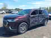 2018 Chevrolet Traverse LT Cloth z VIN 1GNEVGKW9JJ160415, wystawiony jako IAAI lot #42157331 z przebiegiem 101 144 mil mil oraz . Historia ofert i sprzedaży dostępna na DreamBid. Obrazek 2.