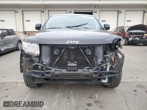 2012 Jeep Grand Cherokee Laredo с VIN 1C4RJEATXCC317054, выставлен на аукционе Copart как лот 63057615 с пробегом 159 633 миль миль и Списание • Salvage title. История ставок и продаж доступна на DreamBid. Изображение 5.