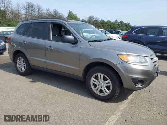 2012 Hyundai Santa Fe GLS с VIN 5XYZGDAG0CG132647, выставлен на аукционе Copart как лот 62227635 с пробегом 193 056 миль миль и Чистый • Clean title. История ставок и продаж доступна на DreamBid. Изображение 4.