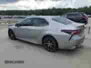 2023 Toyota Camry Hybrid SE with VIN 4T1G31AK9PU620646, listed as a Copart auction lot 64604845 with 110,534 mi miles and Clean title. Bid and sale history available at DreamBid. Image 2.