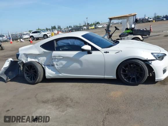 2014 Scion FR-S z VIN JF1ZNAA16E9702001, wystawiony jako IAAI lot #42262041 z przebiegiem 126 942 mil mil oraz . Historia ofert i sprzedaży dostępna na DreamBid. Obrazek 13.