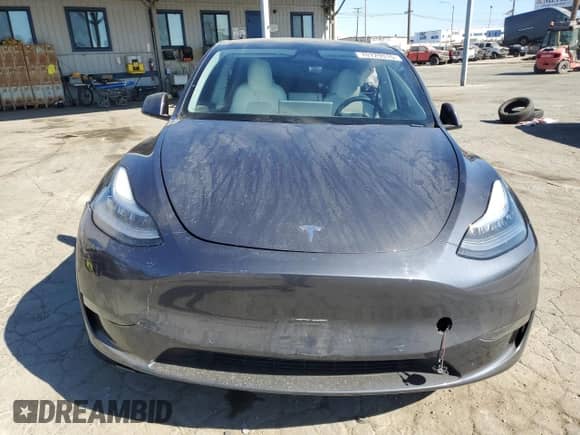 2020 Tesla Model Y Long Range z VIN 5YJYGDEE5LF020261, wystawiony jako Copart lot #70729315 z przebiegiem 74 406 mil mil oraz Szkoda całkowita • Salvage title. Historia ofert i sprzedaży dostępna na DreamBid. Obrazek 5.