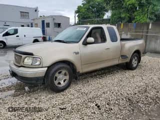 1999 Ford F-150 XL с VIN 1FTRX07L8XKC19449, выставлен на аукционе Copart как лот 86262565 с пробегом Не указан миль и Списание • Salvage title. История ставок и продаж доступна на DreamBid. Изображение 1.