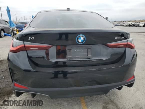 2024 BMW i4 eDrive35 with VIN WBY43AW05RFS57427, listed as a Copart auction lot 65464855 with 7,096 mi miles and Salvage title. Bid and sale history available at DreamBid. Image 6.
