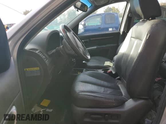 2012 Hyundai Santa Fe Limited с VIN 5XYZKDAG6CG120677, выставлен на аукционе Copart как лот 89695045 с пробегом Не указан миль и Списание • Salvage title. История ставок и продаж доступна на DreamBid. Изображение 7.