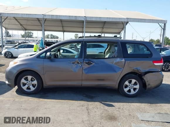 2012 Toyota Sienna with VIN 5TDZK3DC2CS271781, listed as a IAAI auction lot 43138219 with 203,854 mi miles and . Bid and sale history available at DreamBid. Image 14.