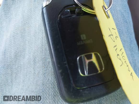 2018 Honda Pilot EX-L with VIN 5FNYF5H50JB006656, listed as a IAAI auction lot 43179982 with 130,515 mi miles and . Bid and sale history available at DreamBid. Image 11.