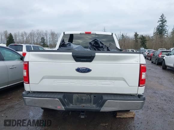 2018 Ford F-150 XL z VIN 1FTEW1EB1JKE15855, wystawiony jako IAAI lot #41496390 z przebiegiem 83 213 mil mil oraz . Historia ofert i sprzedaży dostępna na DreamBid. Obrazek 16.