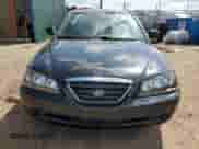 2005 Hyundai Elantra GLS z VIN KMHDN46D45U021031, wystawiony jako Copart lot #70877694 z przebiegiem 184 824 mil mil oraz Szkoda całkowita • Salvage title. Historia ofert i sprzedaży dostępna na DreamBid. Obrazek 5.