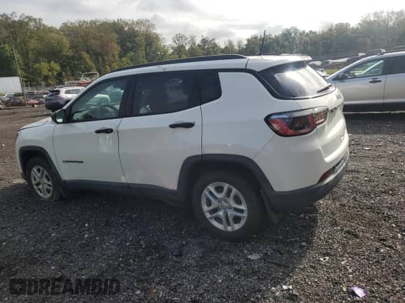 2017 Jeep Compass Sport z VIN 3C4NJCAB0HT668299, wystawiony jako Copart lot #86617385 z przebiegiem 89 906 mil mil oraz Czysty tytuł • Clean title. Historia ofert i sprzedaży dostępna na DreamBid. Obrazek 2.