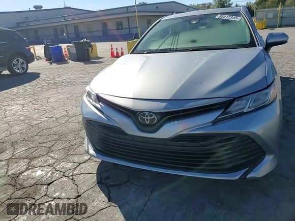 2020 Toyota Camry LE z VIN 4T1C11AK8LU351957, wystawiony jako Copart lot #86512345 z przebiegiem 83 646 mil mil oraz Szkoda całkowita • Salvage title. Historia ofert i sprzedaży dostępna na DreamBid. Obrazek 14.
