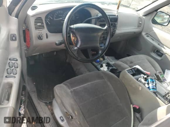 1998 Ford Explorer XLT with VIN 1FMZU35P6WZB60144, listed as a Copart auction lot 90896645 with Not provided miles and Salvage title. Bid and sale history available at DreamBid. Image 8.