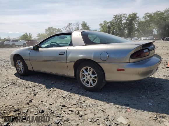 2000 Chevrolet Camaro z VIN 2G1FP22K6Y2103412, wystawiony jako Copart lot #70040684 z przebiegiem 97 796 mil mil oraz Czysty tytuł • Clean title. Historia ofert i sprzedaży dostępna na DreamBid. Obrazek 2.