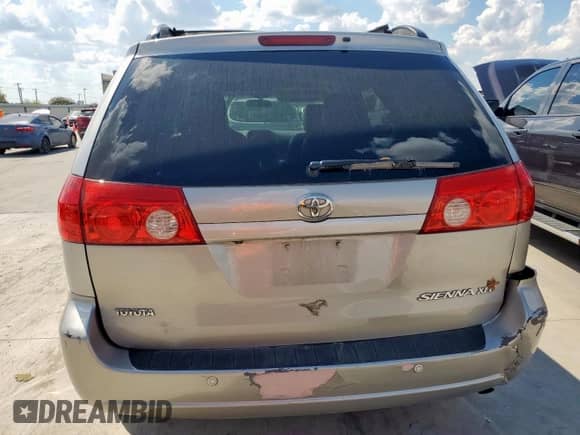 2010 Toyota Sienna XLE с VIN 5TDYK4CC9AS342491, выставлен на аукционе Copart как лот 84887455 с пробегом 241 451 миль миль и Списание • Salvage title. История ставок и продаж доступна на DreamBid. Изображение 6.