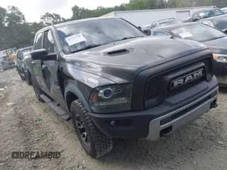 2017 Ram 1500 Rebel z VIN 1C6RR7YT1HS539870, wystawiony jako IAAI lot #42755780 z przebiegiem 109 690 mil mil oraz . Historia ofert i sprzedaży dostępna na DreamBid. Obrazek 1.