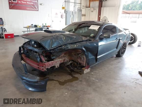 2007 Ford Mustang GT Deluxe z VIN 1ZVHT82H375269051, wystawiony jako IAAI lot #43065551 z przebiegiem 94 434 mil mil oraz . Historia ofert i sprzedaży dostępna na DreamBid. Obrazek 23.