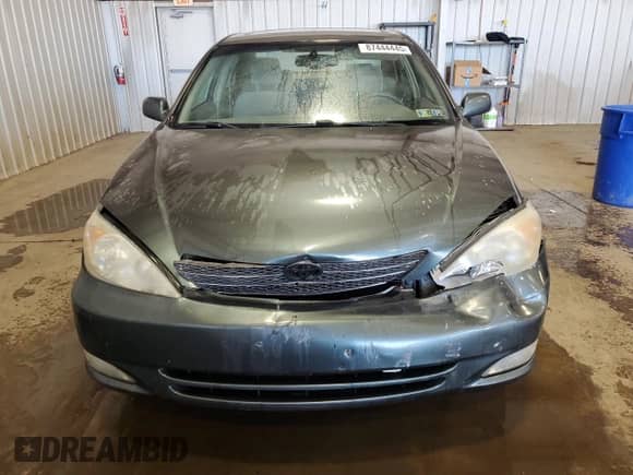 2003 Toyota Camry XLE с VIN 4T1BE30K43U704577, выставлен на аукционе Copart как лот 87444445 с пробегом 205 977 миль миль и Списание • Salvage title. История ставок и продаж доступна на DreamBid. Изображение 5.