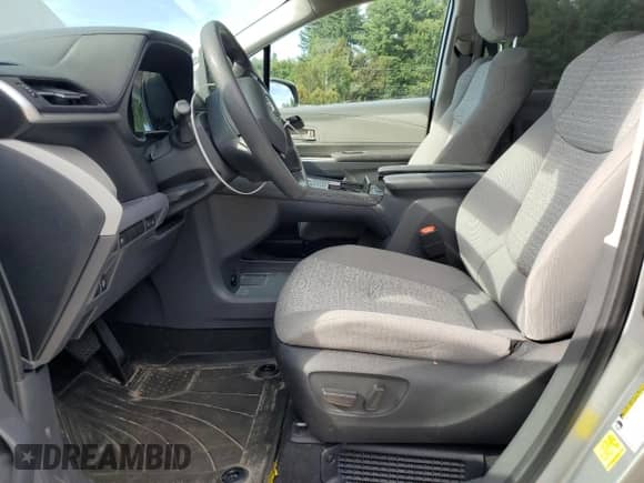 2023 Toyota Sienna LE with VIN 5TDKSKFC6PS092223, listed as a Copart auction lot 80493715 with 27,214 mi miles and Salvage title. Bid and sale history available at DreamBid. Image 7.