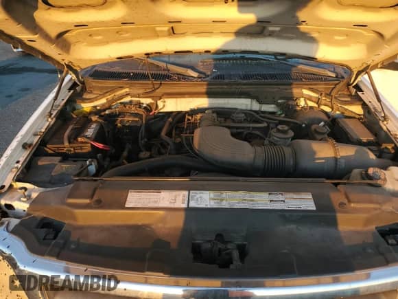 2000 Ford F-150 XL z VIN 1FTRX17L9YKA94727, wystawiony jako Copart lot #72477424 z przebiegiem Nie podano mil oraz Czysty tytuł • Clean title. Historia ofert i sprzedaży dostępna na DreamBid. Obrazek 11.