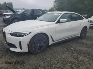 2023 BMW i4 eDrive35 with VIN WBY43AW01PFP56061, listed as a Copart auction lot 66226165 with 16,880 mi miles and Salvage title. Bid and sale history available at DreamBid. Image 1.