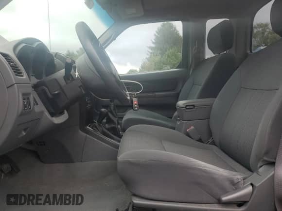 2004 Nissan Frontier XE Desert Runner z VIN 1N6ED26Y34C478210, wystawiony jako Copart lot #85009155 z przebiegiem 117 023 mil mil oraz Szkoda całkowita • Salvage title. Historia ofert i sprzedaży dostępna na DreamBid. Obrazek 7.