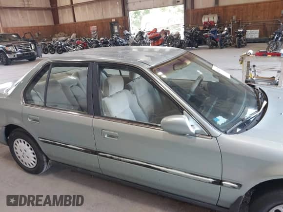 1992 Honda Accord LX with VIN JHMCB7658NC016387, listed as a IAAI auction lot 42682778 with 113,566 mi miles and . Bid and sale history available at DreamBid. Image 12.