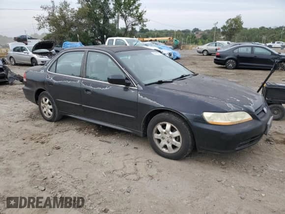 2002 Honda Accord EX with VIN 1HGCG56662A172016, listed as a Copart auction lot 84410955 with 162,488 mi miles and Clean title. Bid and sale history available at DreamBid. Image 4.