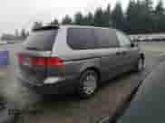 1999 Honda Odyssey LX with VIN 2HKRL185XXH510695, listed as a Copart auction lot 84907294 with 157,608 mi miles and Salvage title. Bid and sale history available at DreamBid. Image 3.