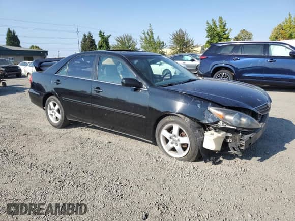 2002 Toyota Camry XLE с VIN 4T1BF30K82U015833, выставлен на аукционе Copart как лот 70534855 с пробегом 191 212 миль миль и Списание • Salvage title. История ставок и продаж доступна на DreamBid. Изображение 4.