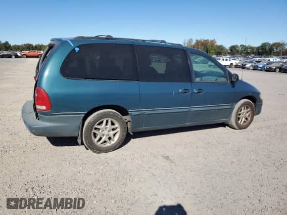 2000 Dodge Caravan with VIN 1B4GP54G8YB665501, listed as a Copart auction lot 73558554 with 223,855 mi miles and Salvage title. Bid and sale history available at DreamBid. Image 3.
