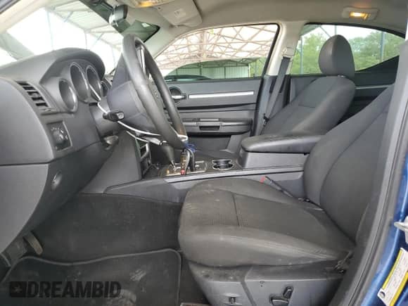 2009 Dodge Charger SXT с VIN 2B3KA33V79H514212, выставлен на аукционе Copart как лот 73103164 с пробегом 211 375 миль миль и Списание • Salvage title. История ставок и продаж доступна на DreamBid. Изображение 7.