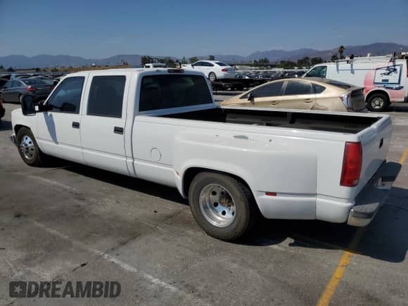 1999 Chevrolet Silverado 3500 with VIN 1GCHC33J7XF024092, listed as a Copart auction lot 64849475 with 188,547 mi miles and Non repairable. Bid and sale history available at DreamBid. Image 2.