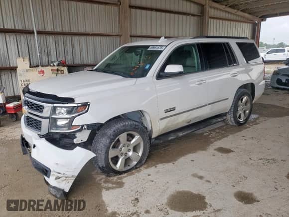 2015 Chevrolet Tahoe LT with VIN 1GNSCBKC7FR688853, listed as a Copart auction lot 69991575 with 183,449 mi miles and Salvage title. Bid and sale history available at DreamBid. Image 1.
