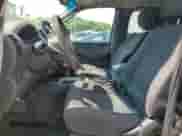 2010 Nissan Frontier SE with VIN 1N6AD0CWXAC402288, listed as a Copart auction lot 68748555 with 238,383 mi miles and Salvage title. Bid and sale history available at DreamBid. Image 7.