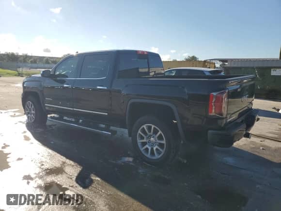 2018 GMC Sierra 1500 Denali z VIN 3GTP1PEC7JG387781, wystawiony jako Copart lot #84014725 z przebiegiem 89 899 mil mil oraz Szkoda całkowita • Salvage title. Historia ofert i sprzedaży dostępna na DreamBid. Obrazek 2.