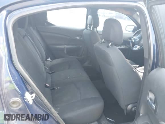 2013 Dodge Avenger SXT with VIN 1C3CDZCBXDN615817, listed as a IAAI auction lot 43282287 with 245,259 mi miles and . Bid and sale history available at DreamBid. Image 8.