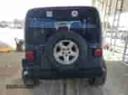 2002 Jeep Wrangler Sport z VIN 1J4FA49S22P715529, wystawiony jako Copart lot #89871905 z przebiegiem 133 220 mil mil oraz Szkoda całkowita • Salvage title. Historia ofert i sprzedaży dostępna na DreamBid. Obrazek 6.