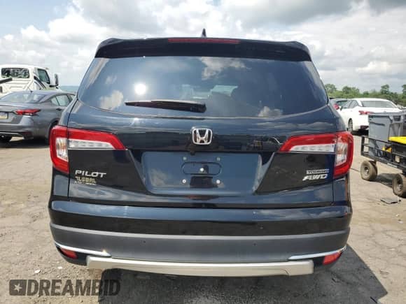 2022 Honda Pilot Touring 7-Passenger z VIN 5FNYF6H62NB057161, wystawiony jako Copart lot #64944655 z przebiegiem 21 694 mil mil oraz Szkoda całkowita • Salvage title. Historia ofert i sprzedaży dostępna na DreamBid. Obrazek 6.