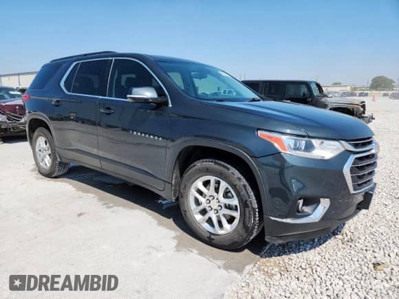 2020 Chevrolet Traverse LT Cloth z VIN 1GNERGKW1LJ228519, wystawiony jako Copart lot #80440645 z przebiegiem 128 089 mil mil oraz Czysty tytuł • Clean title. Historia ofert i sprzedaży dostępna na DreamBid. Obrazek 4.