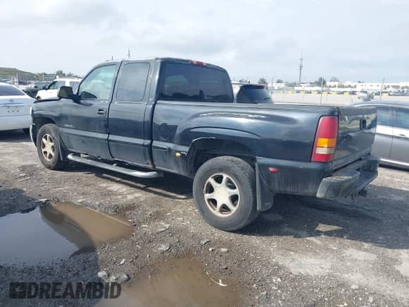 2002 GMC Sierra 1500 Denali z VIN 2GTFK69U421373269, wystawiony jako IAAI lot #41393988 z przebiegiem 180 672 mil mil oraz . Historia ofert i sprzedaży dostępna na DreamBid. Obrazek 3.
