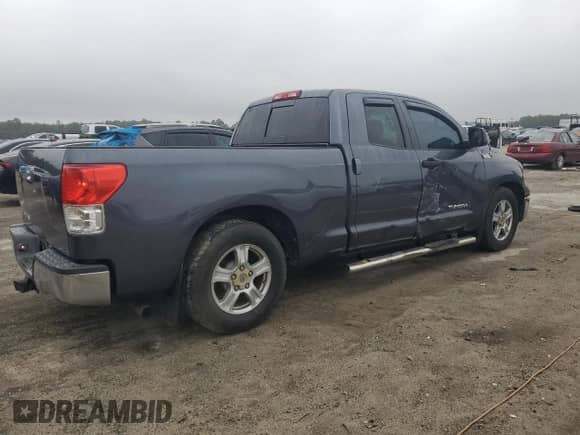2010 Toyota Tundra с VIN 5TFRY5F16AX086274, выставлен на аукционе Copart как лот 90107315 с пробегом 138 549 миль миль и Списание • Salvage title. История ставок и продаж доступна на DreamBid. Изображение 3.