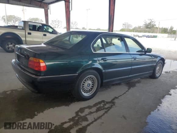 1999 BMW 7 Series 740iL z VIN WBAGH8332XDP05104, wystawiony jako Copart lot #45527535 z przebiegiem 87 312 mil mil oraz Czysty tytuł • Clean title. Historia ofert i sprzedaży dostępna na DreamBid. Obrazek 3.