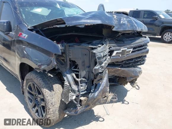 2024 Chevrolet Silverado 1500 RST with VIN 1GCUDEED8RZ166452, listed as a IAAI auction lot 43095521 with 50,889 mi miles and . Bid and sale history available at DreamBid. Image 6.