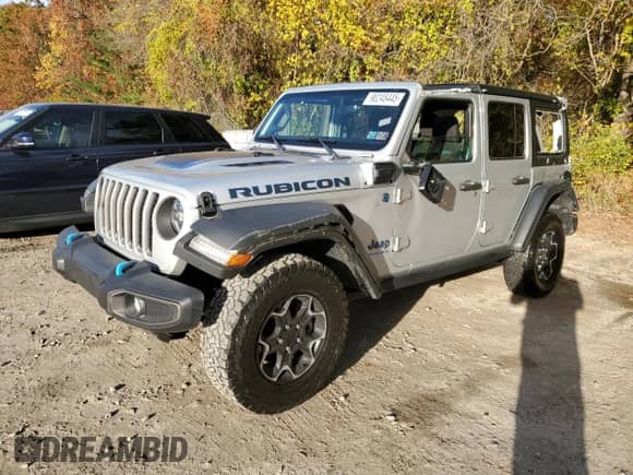 2023 Jeep Wrangler Rubicon with VIN 1C4JJXR61PW630974, listed as a Copart auction lot 90245445 with 57,589 mi miles and Clean title. Bid and sale history available at DreamBid. Image 1.